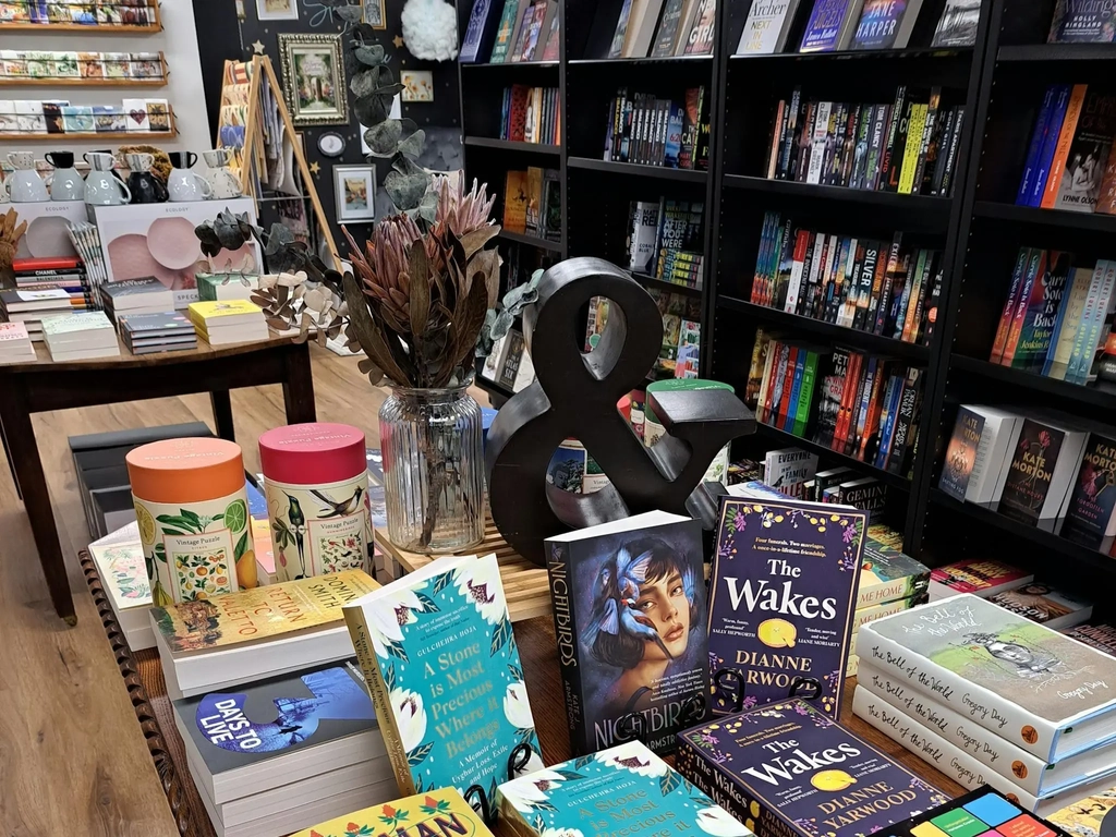 A table covered in books and goodies