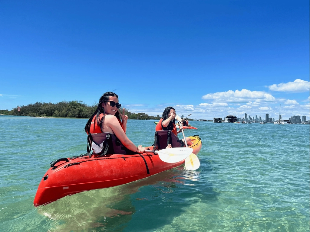Kayaking though the crystal waters of Wave break Island, Gold Coast
