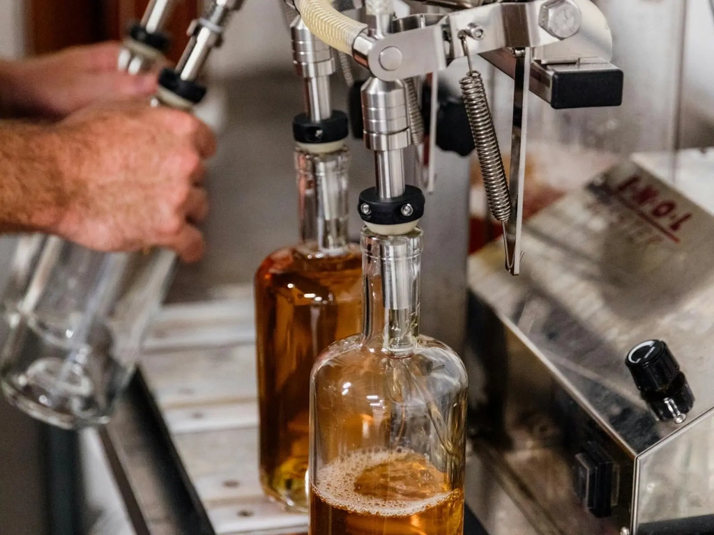 Staff conducting the rum blending process at Capricorn Distilling Co.