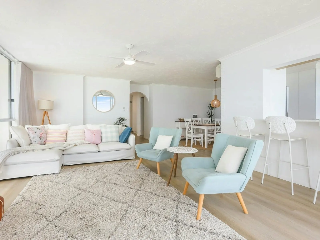 Lounge room connecting to dining room, open plan living, seacrest apartments in surfers paradise