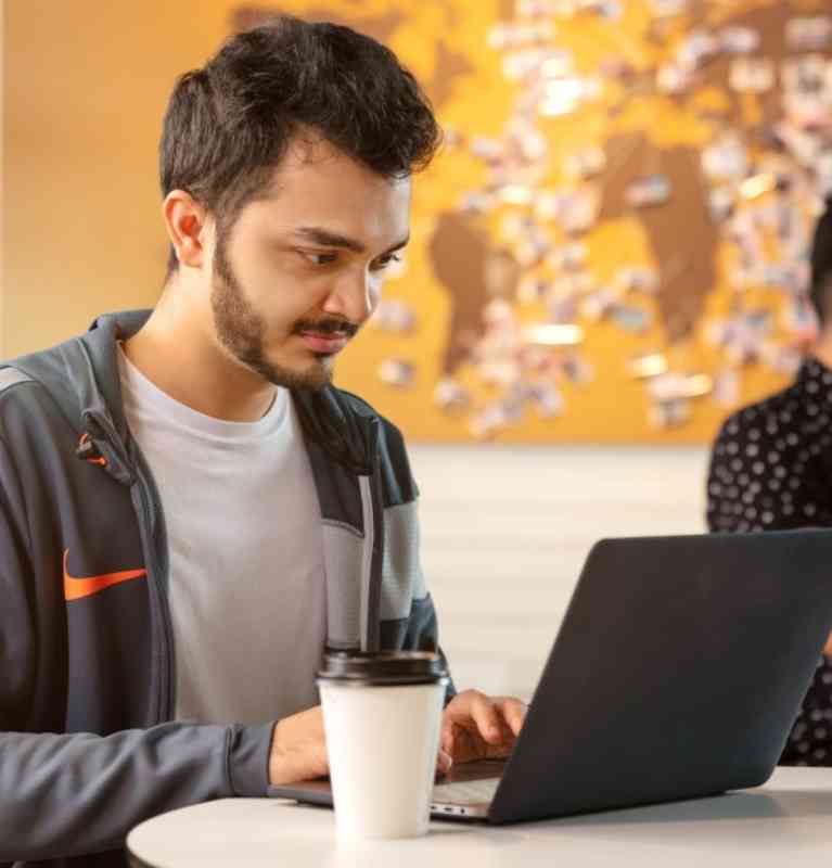 Man studying at Student Hub - mobile banner