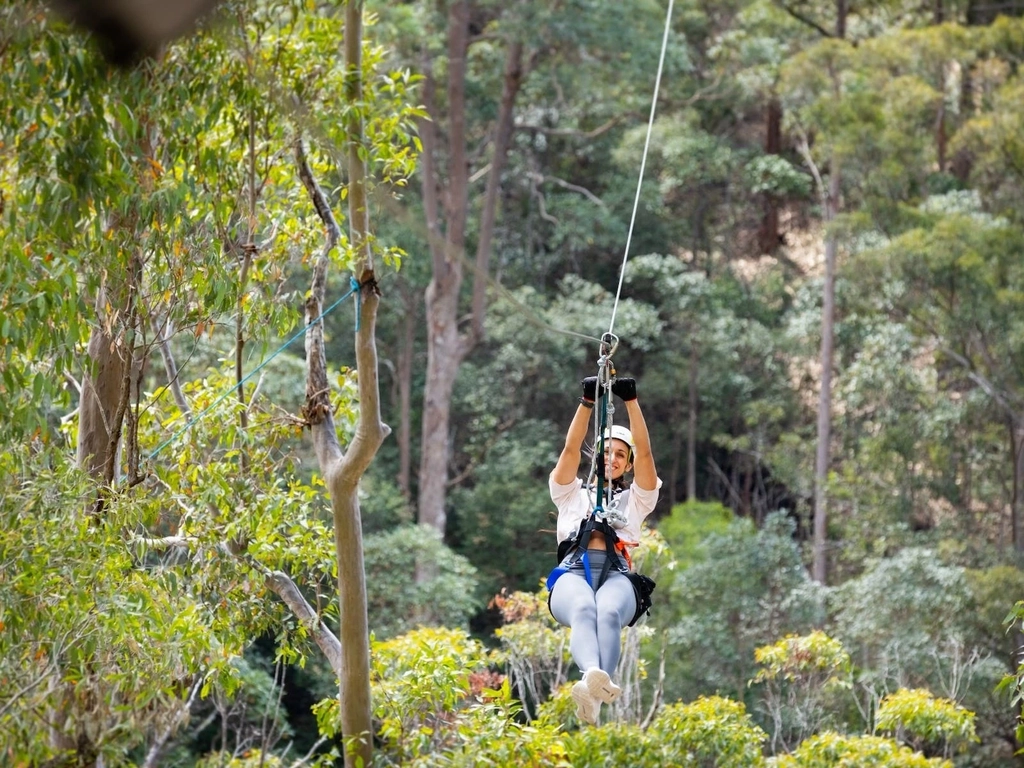 Woman smiling on zipline