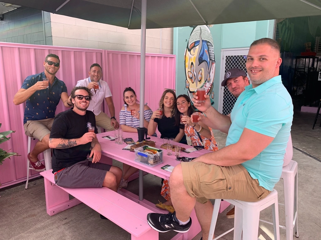 A group of friends with beer at Lost Palms