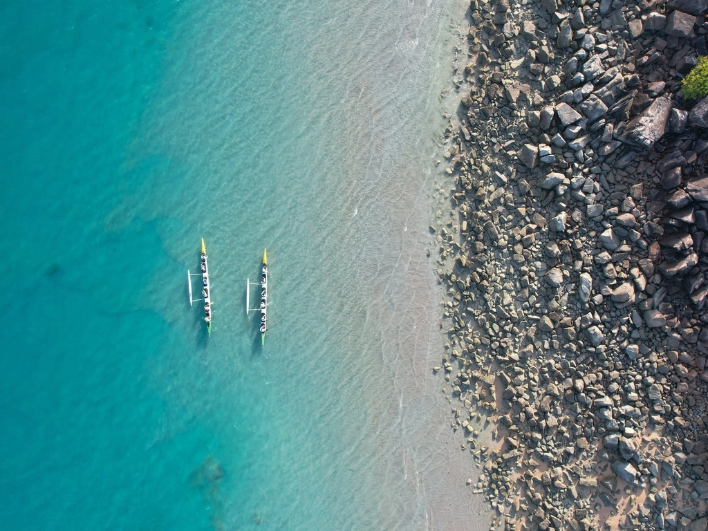 Outrigger canoe expedition around the islands of the Straits
