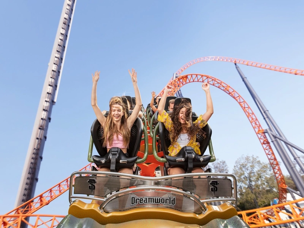 Two teens riding the Steel Taipan rollercoaster at Dreamworld