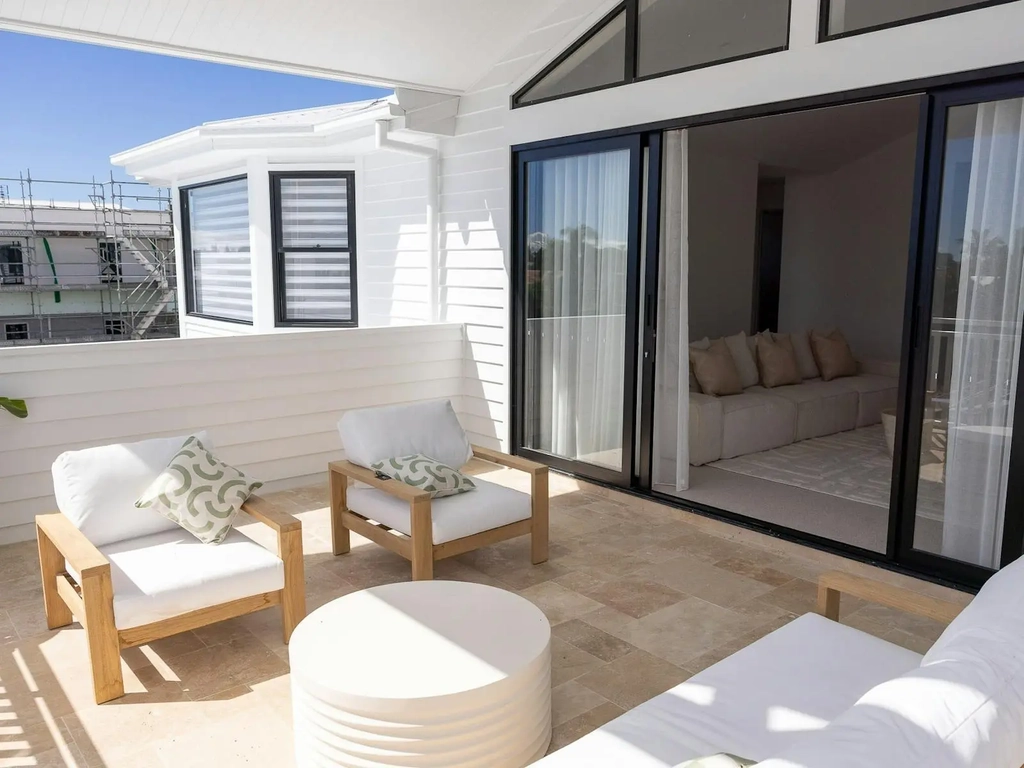 Outdoor lounge on a covered upper terrace