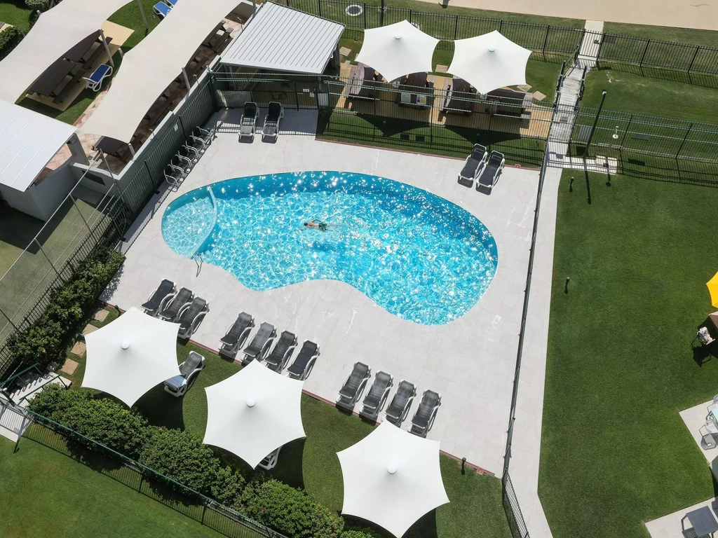 The newly renovated pool overlooks the ocean