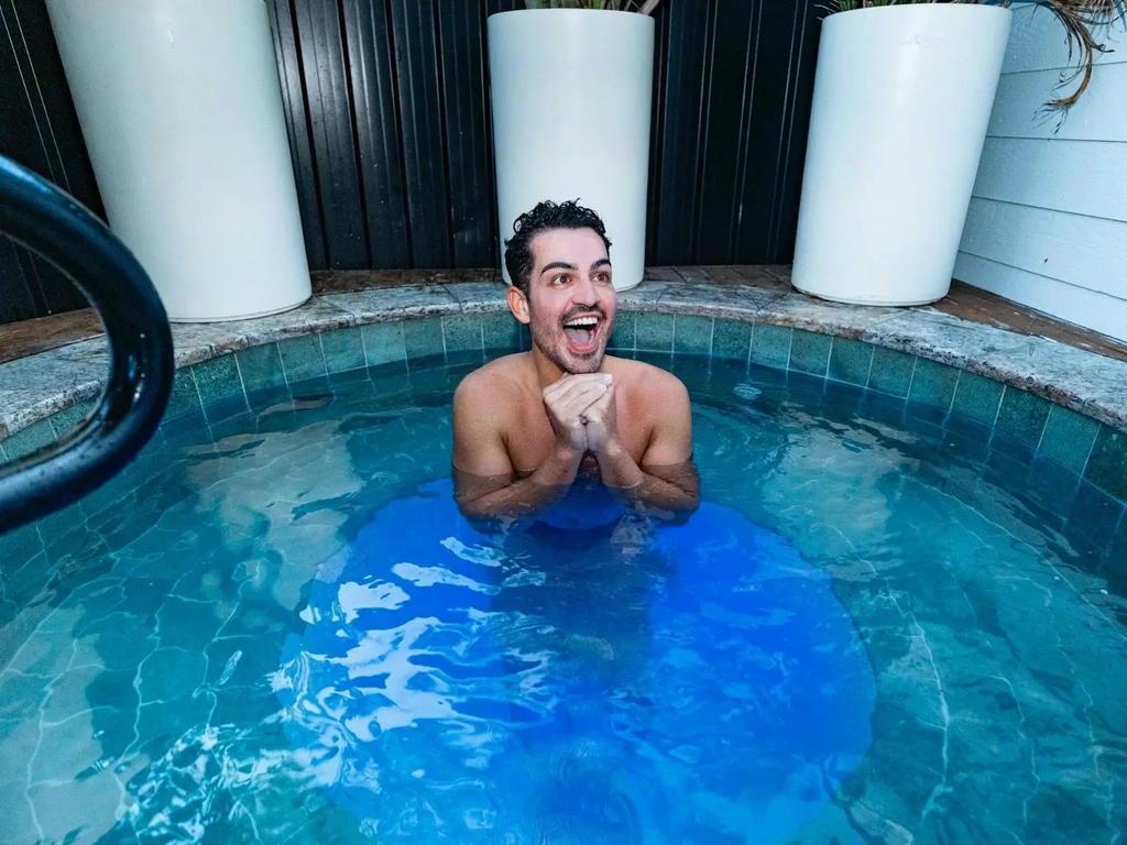 man in cold plunge