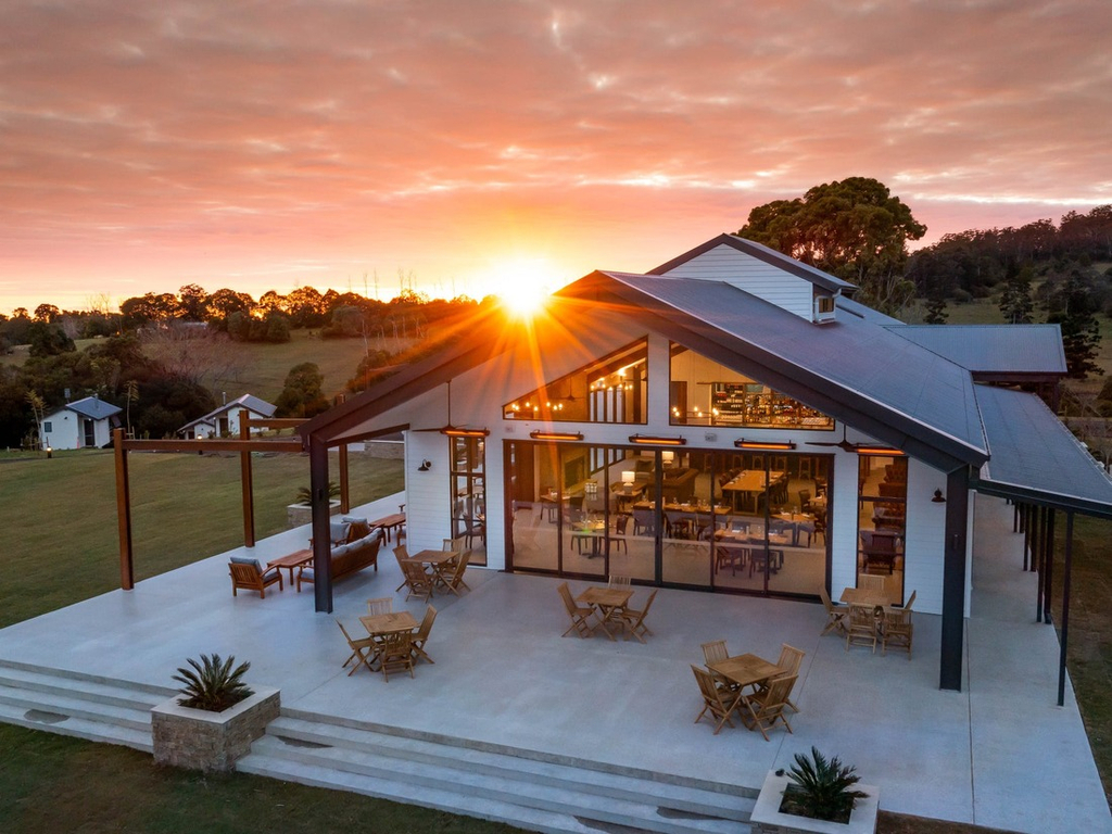 Exterior photo of The Paddock restaurant, Hazelwood Estate at sunset