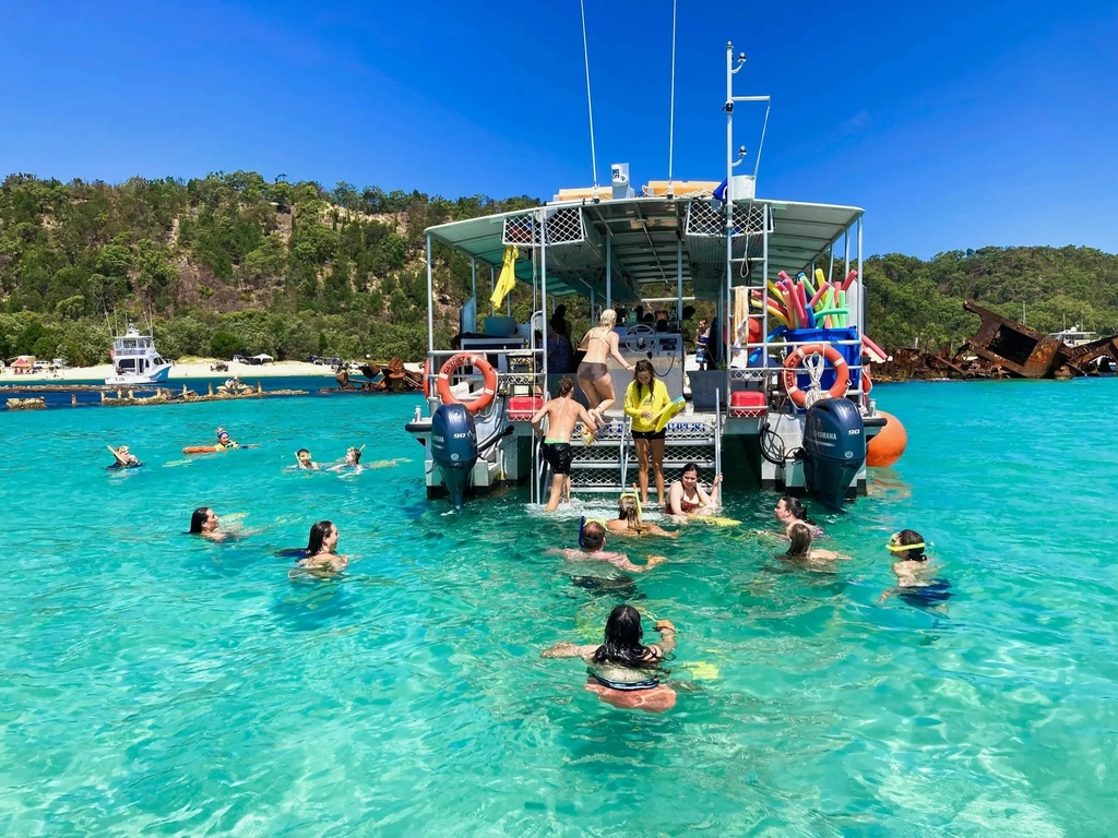 Group of snorkelers boarding snorkel barge