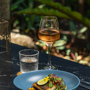 Rainforest Restaurant table with rose and barramundi