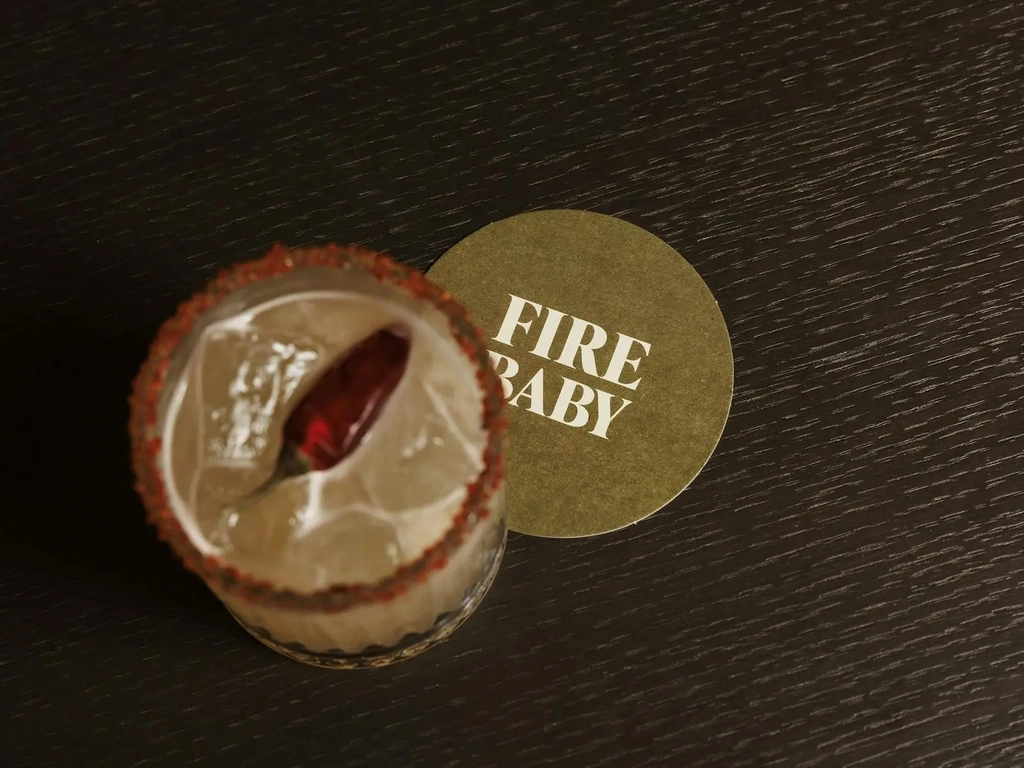 Fire Baby Margarita on top of a Fire Baby Coaster