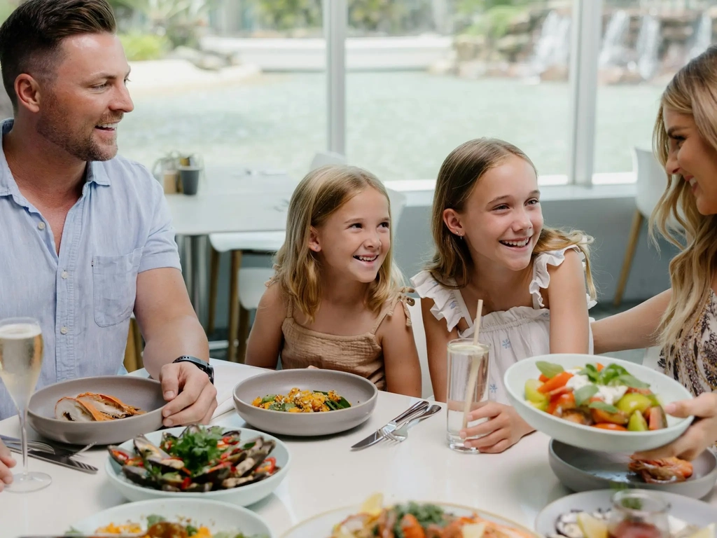 Family enjoying Seafood Buffet at Terraces Restaurant