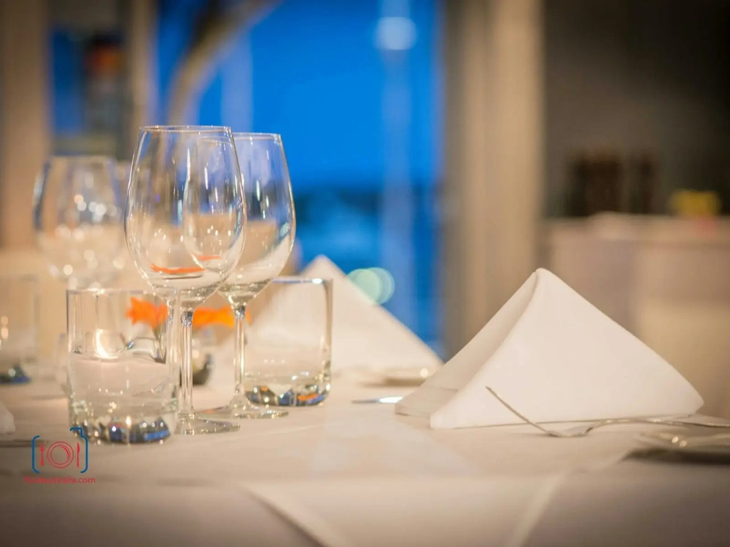 white table cloth with wine glasses