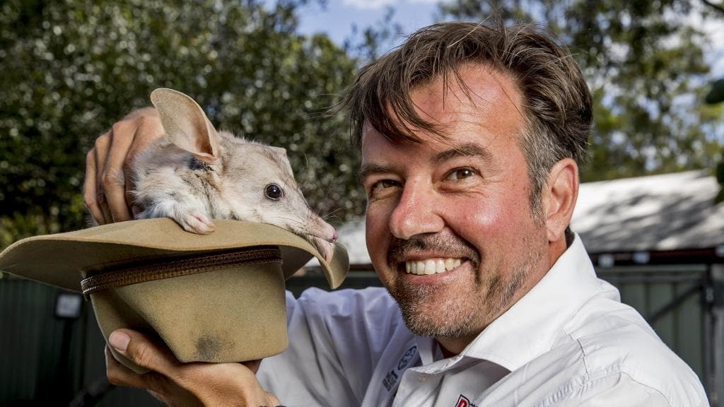 Wildlife and Indigenous relations expert, Al Mucci holding a Bilby in an Akubra hat