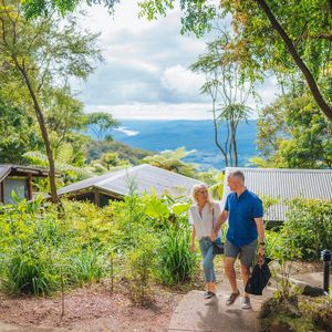 An image of a couple exploring the Binna Burra Campsite