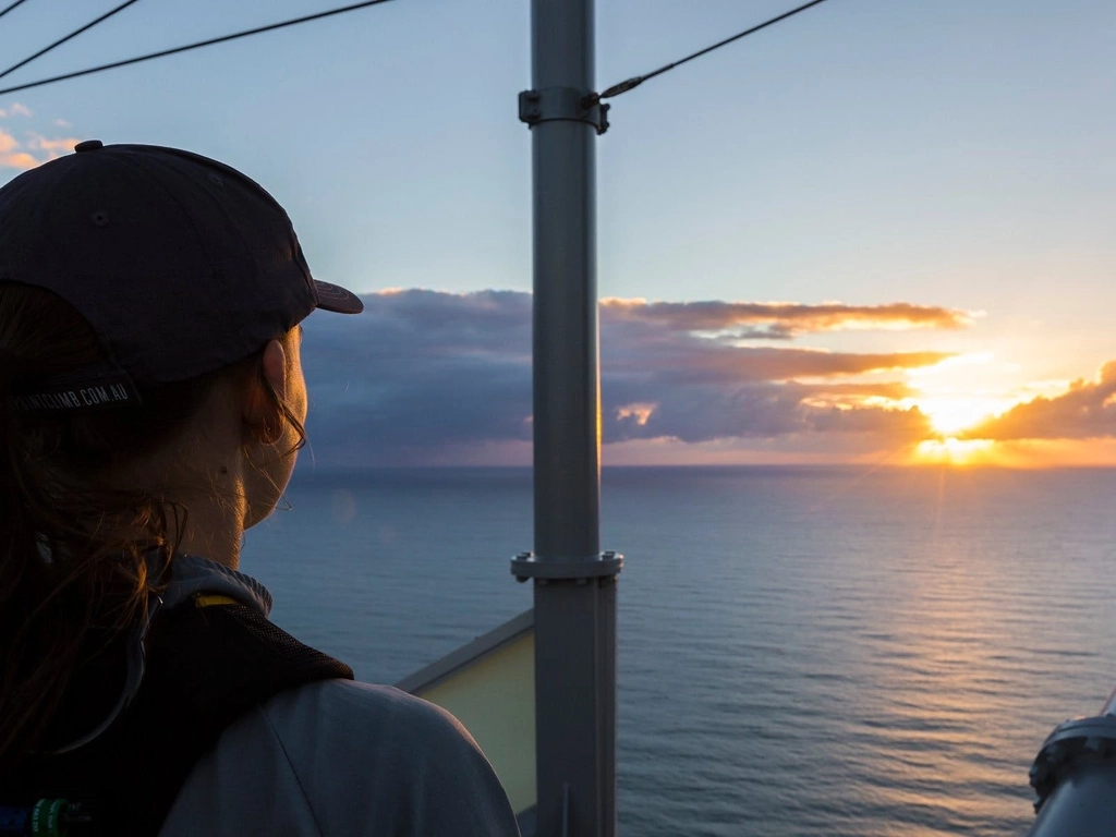 Climber watching the sunrise