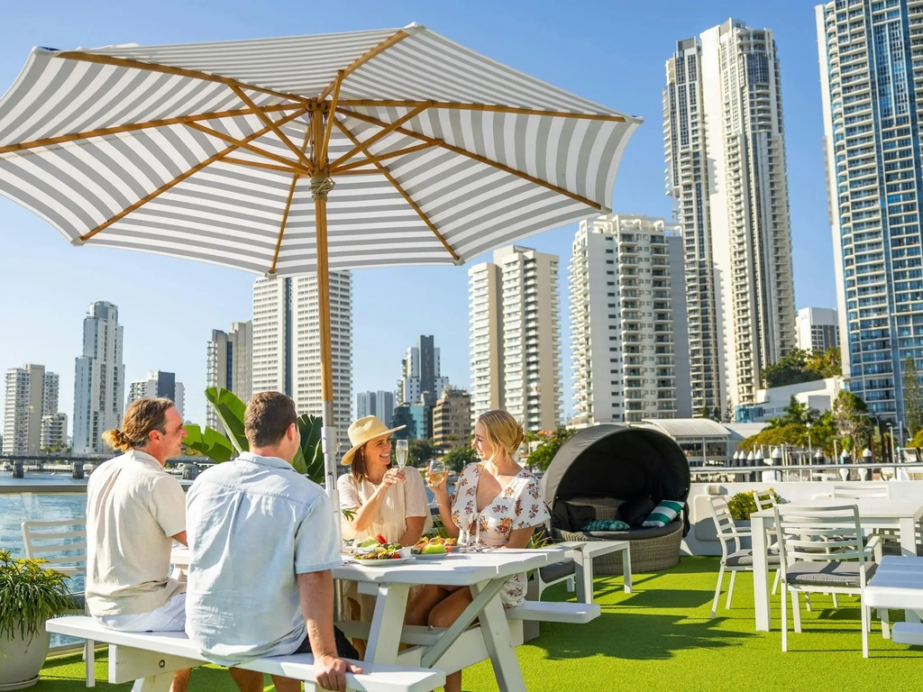 Group of friends enjoying lunch on a cruise