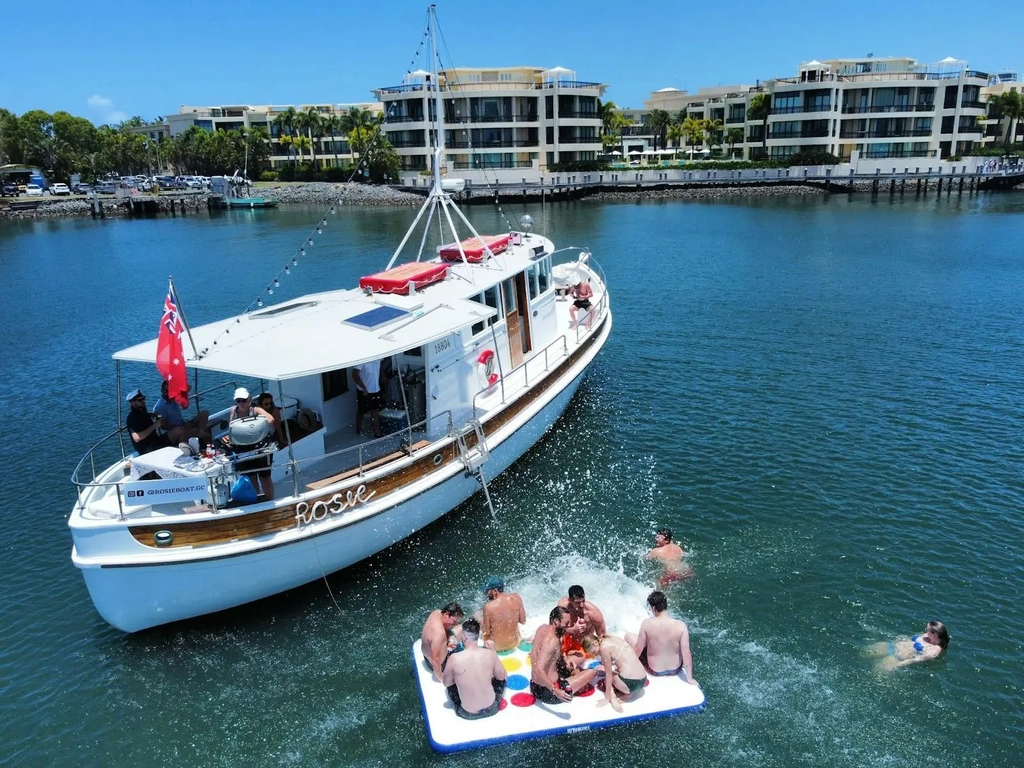 roup of friends enjoying a daytime Rosie Boat charter on the Gold Coast Broadwater