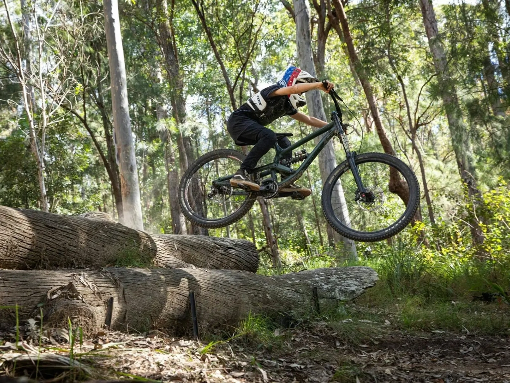 rider jumping log