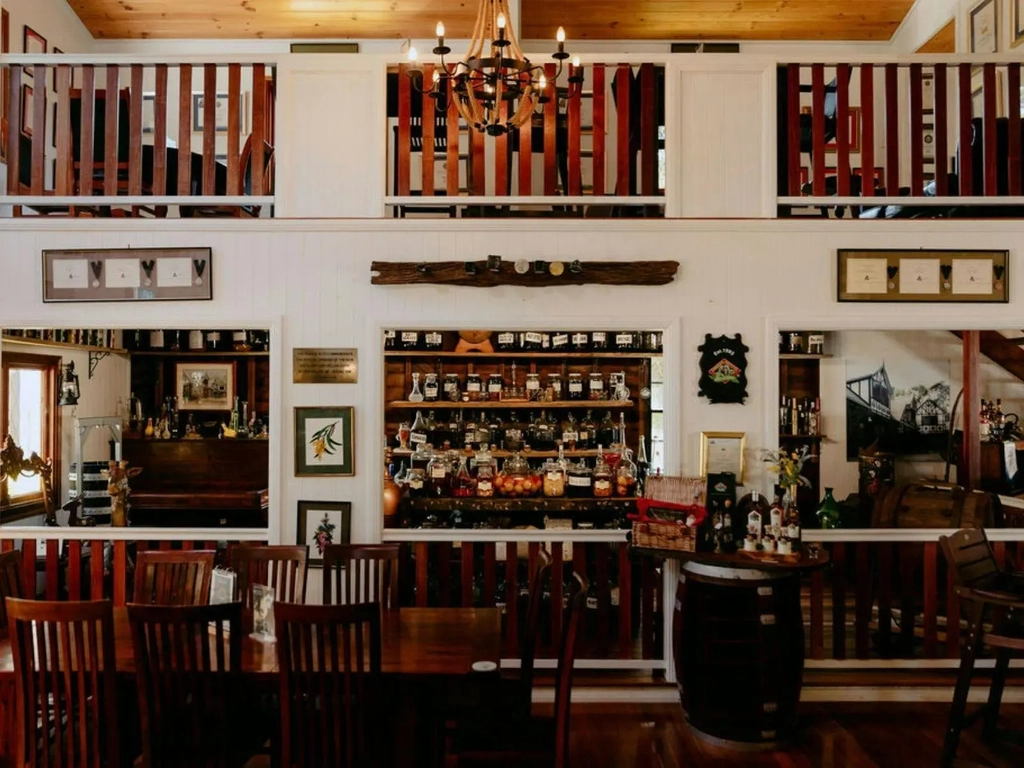 Warm timber tasting room interior at Tamborine Mountain Distillery.