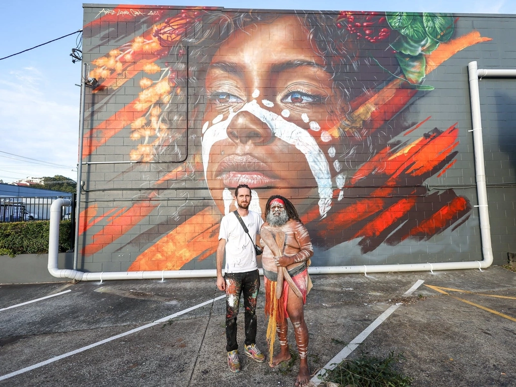 Mural painted by Adnate in collaboration with Luther Cora, a Yugambeh photographer.