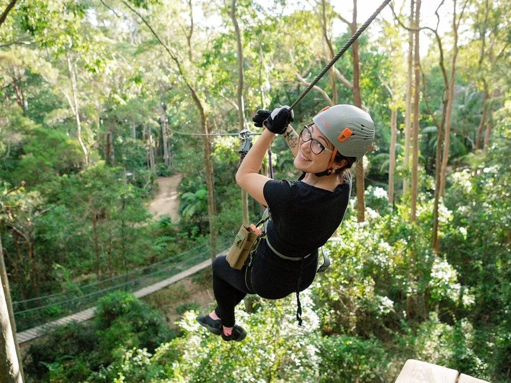 Woman smiling on zipline