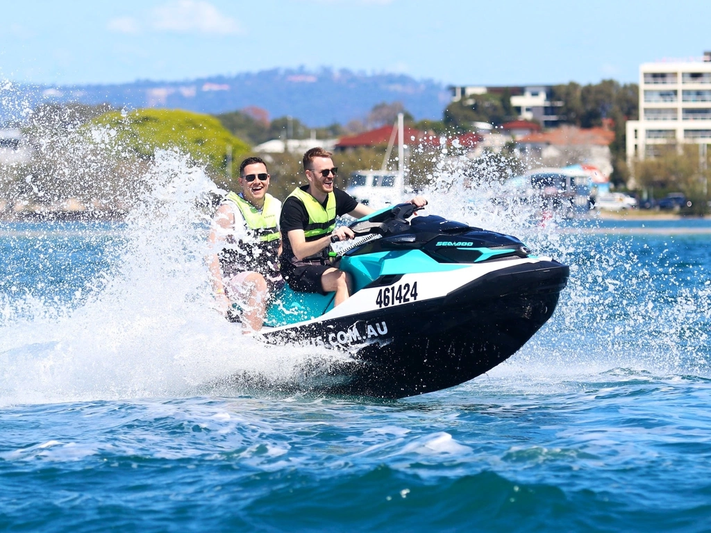 Two men having fun on a jet ski