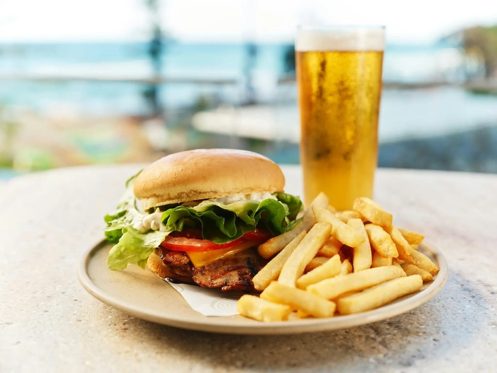 Hurricane's Surfers Paradise - Beef Burger, Chips & Beer On A Plate With Ocean View.