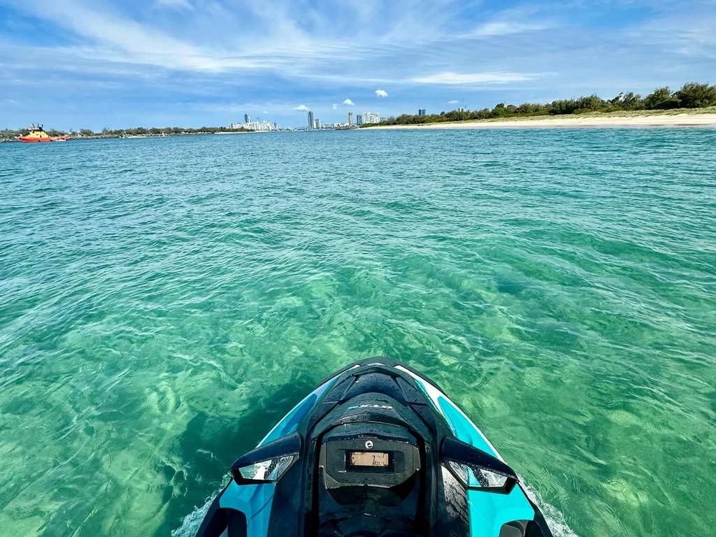 Cruise through the crystal water of Wave Break Island