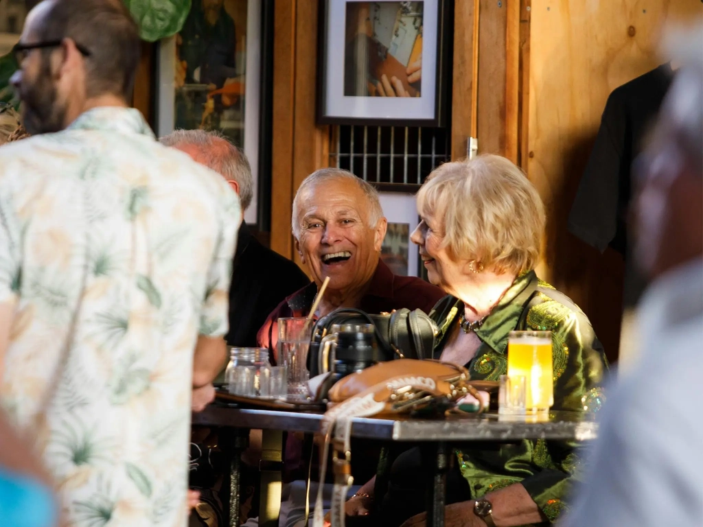 Guests enjoying drinks together at Granddad Jack’s Craft Distillery.
