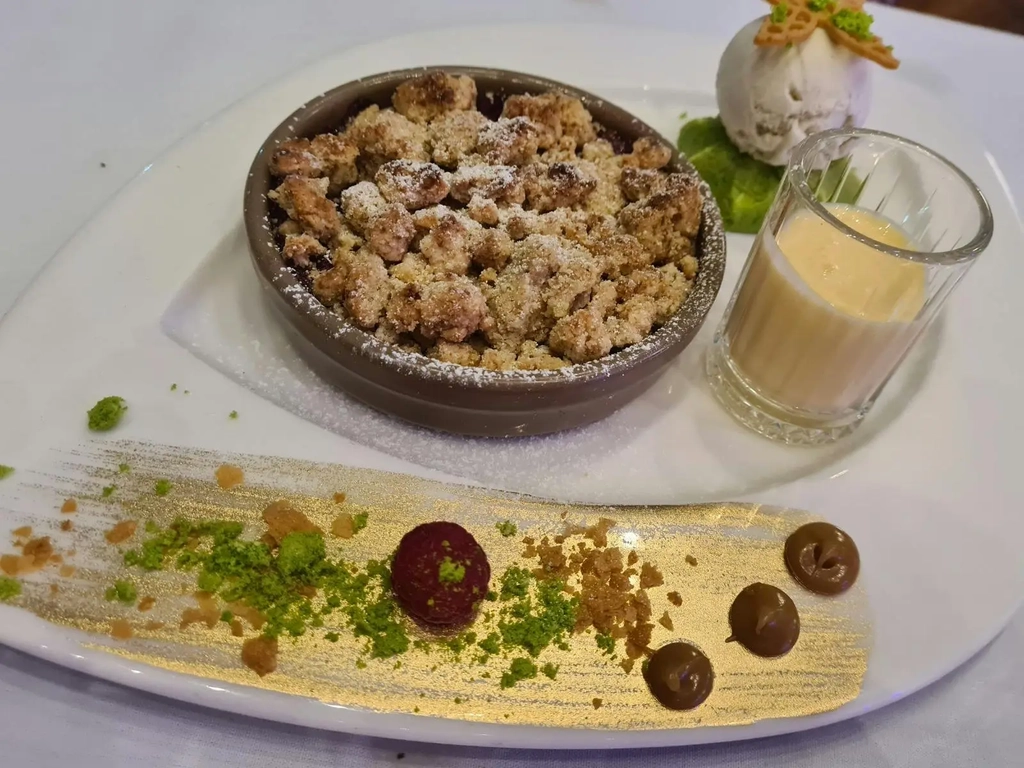Apple Rhubarb Crumble with vanilla bean ice cream and custard