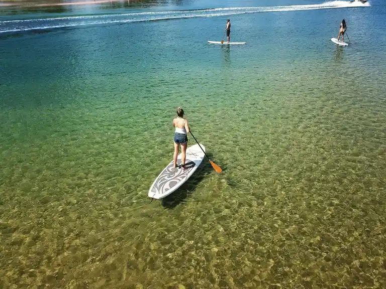 Stand up Paddle Boarding. All Coast Paddle Board Hire. Tallebudgera Creek. Gold Coast