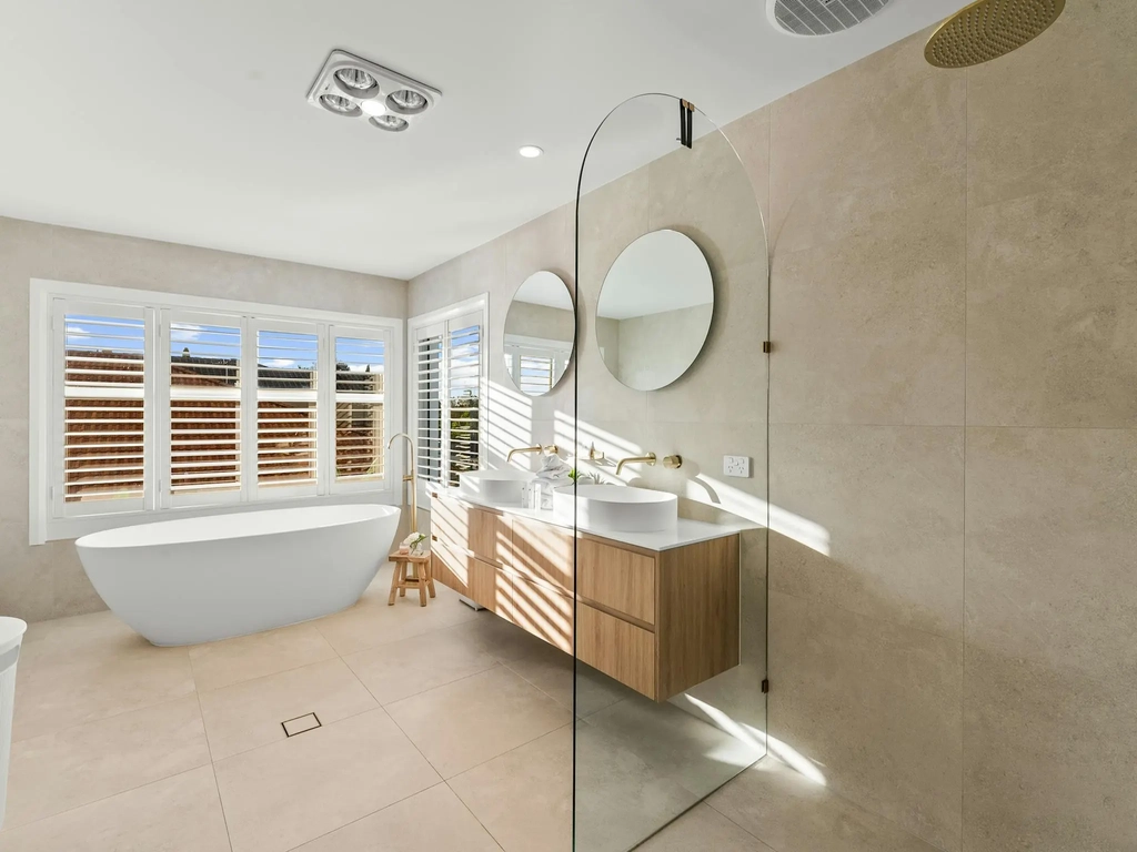 Ensuite bathroom with a freestanding bath and double vanity