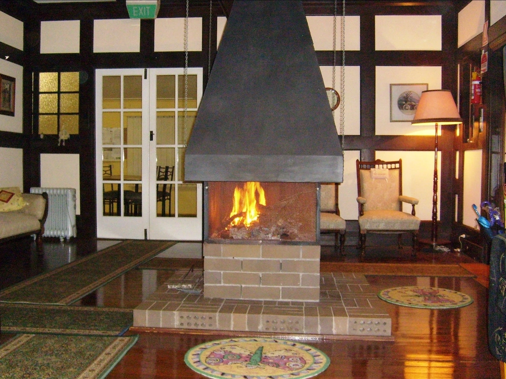 Beautiful fireplace at Mystery Mountain Farmstay