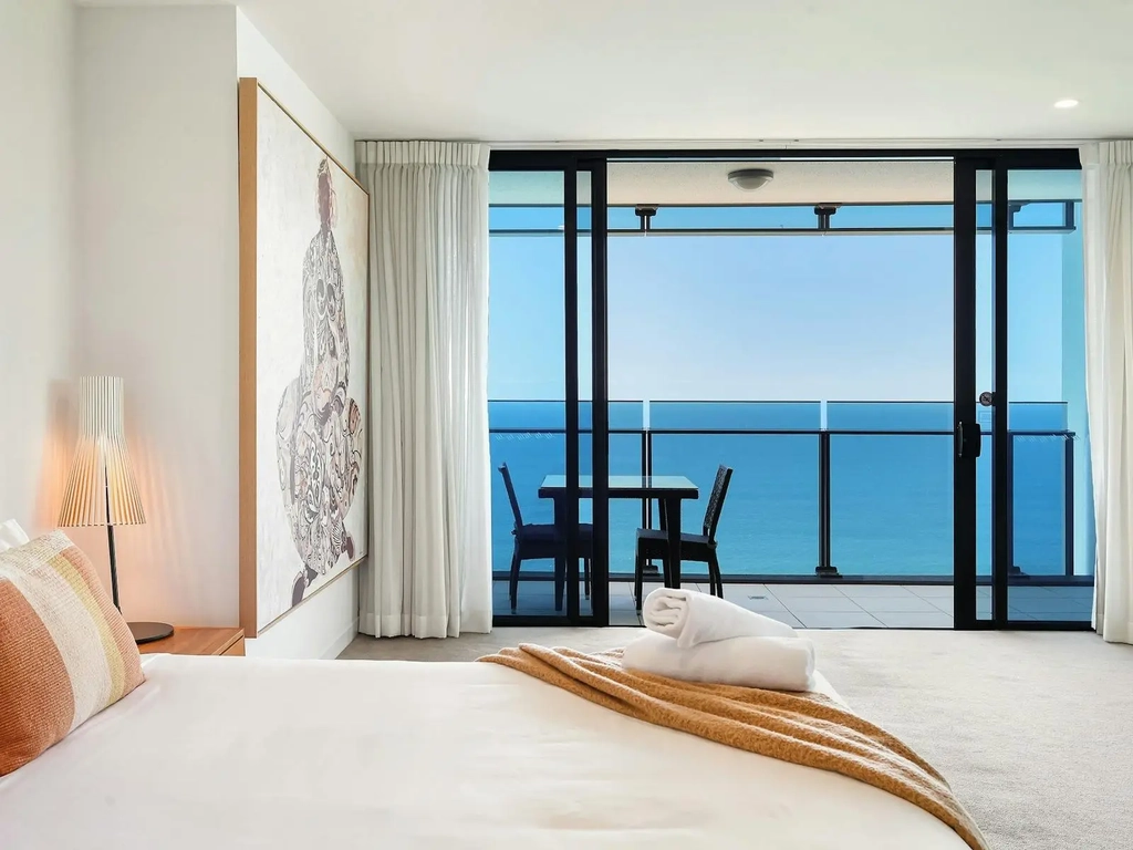 Master bedroom with a king bed, own balcony with ocean views, ensuite with bath tub Soul Peppers