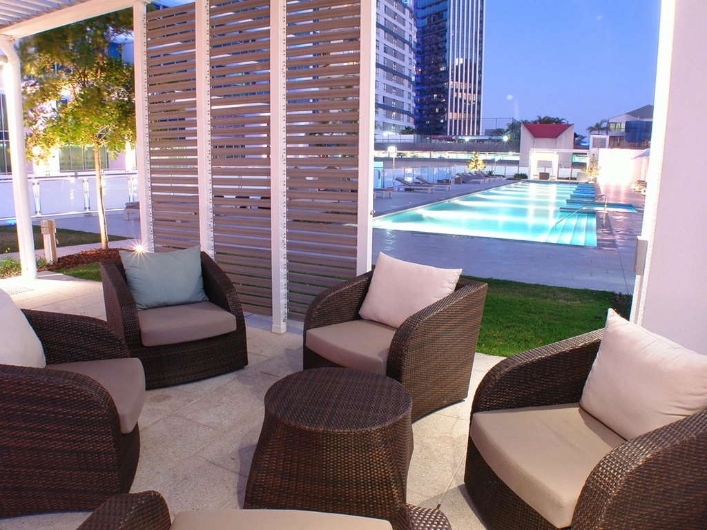 Relax by the pool at The H Residences