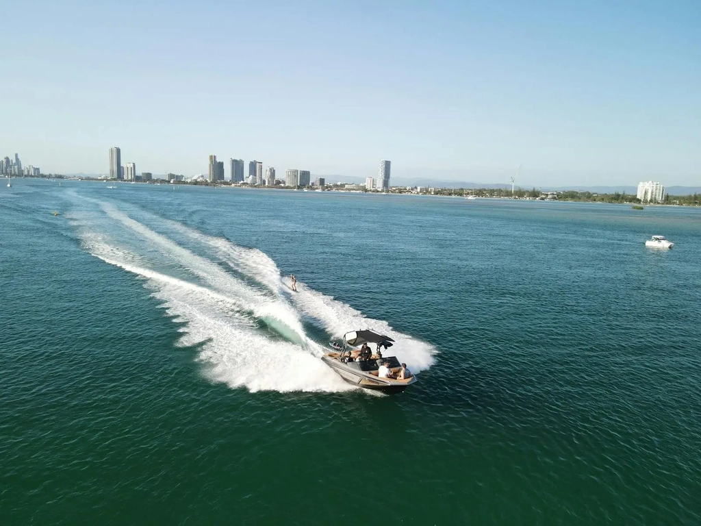 Crystal clear skies, beautiful blue Broadwater with Surfers skyline in the background.