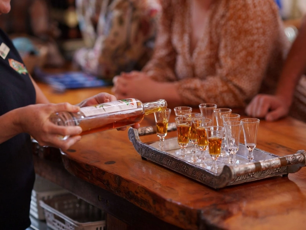 drinks being poured on a bar