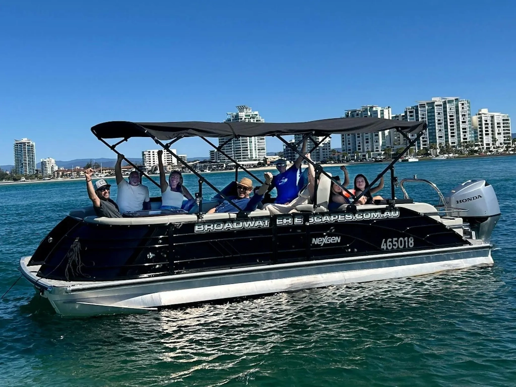 Broadwater Escapes self-drive 150hp 9 seater pontoon boat cruising the Gold Coast.