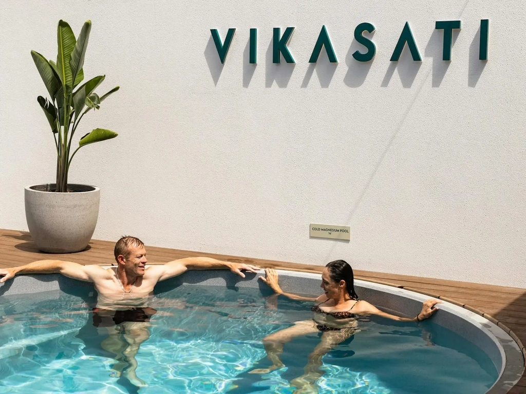 Couple relaxing in hot pool