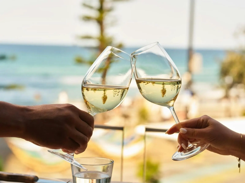 Hurricane's Surfers Paradise - Two Glasses of White Wines With A Beach View