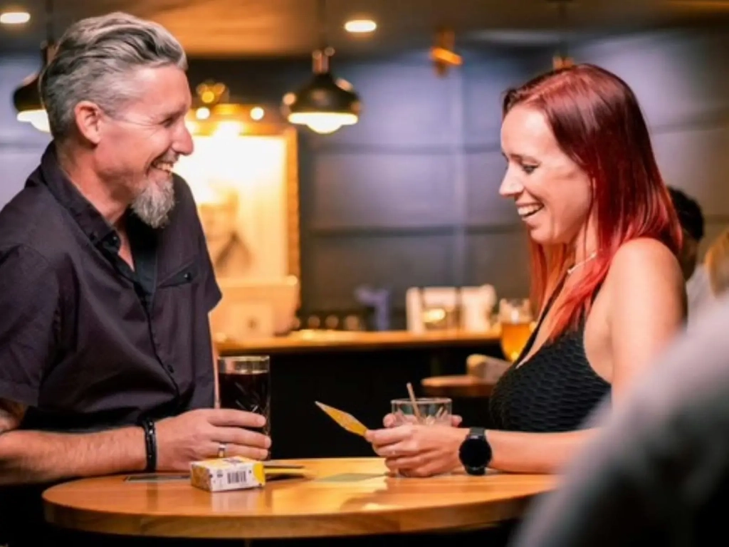 Couple enjoying a drink together