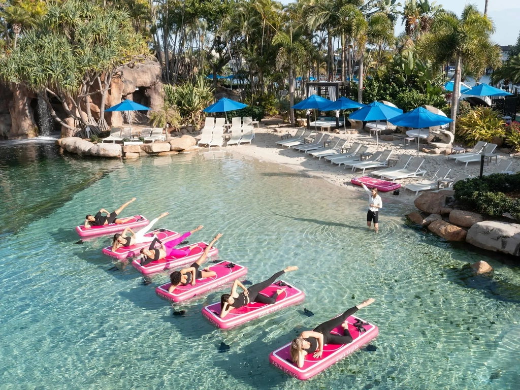 Group of women doing Aqua Sculpt Floating Pilates experience at JW Marriott Gold Coast Resort & Spa