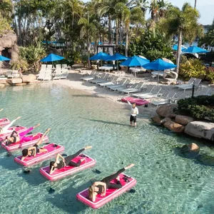 Group of women doing Aqua Sculpt Floating Pilates experience at JW Marriott Gold Coast Resort & Spa