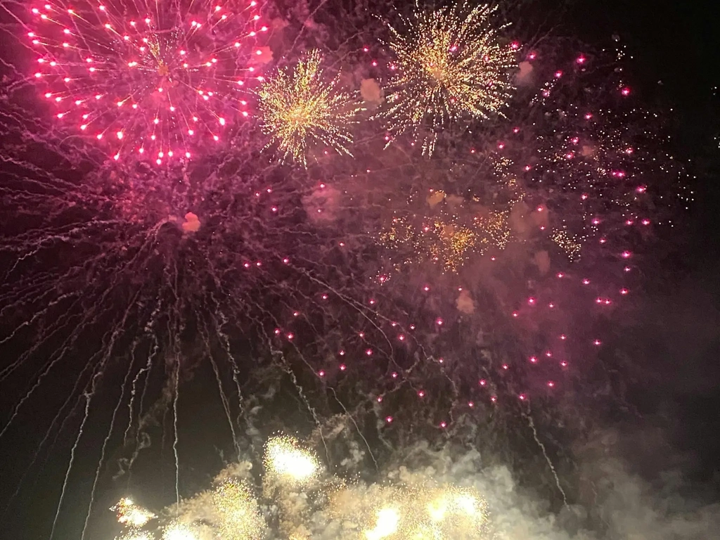 Watch the fireworks from a boat