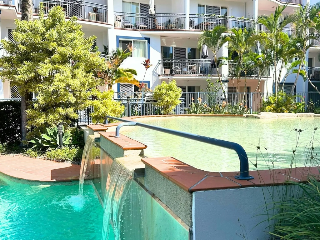 2 pools in one Childrens lap pool with water feature to main pool