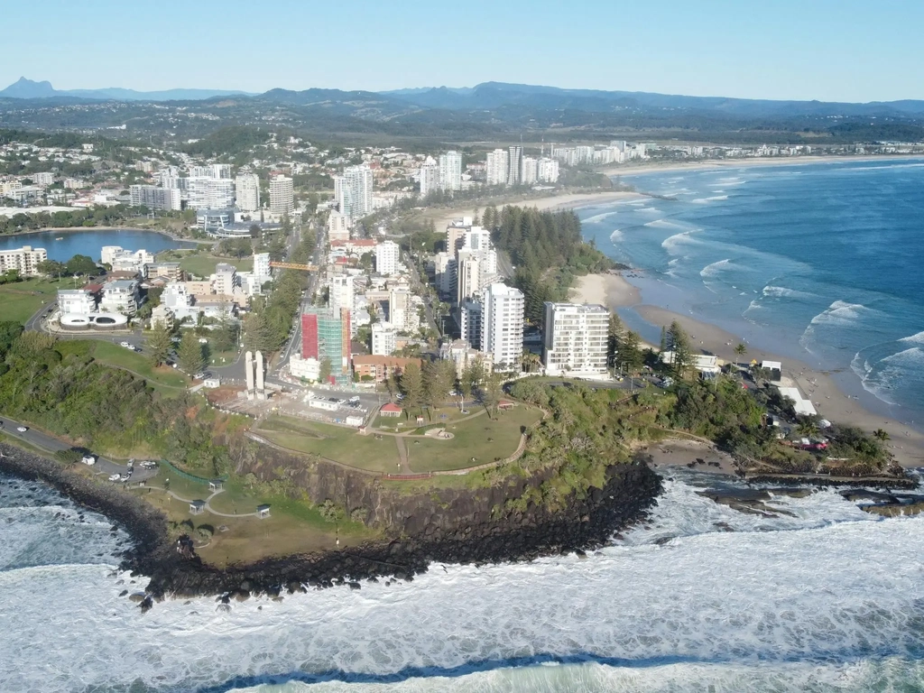 A drone photo of Point Danger showing Wollumbin in the background