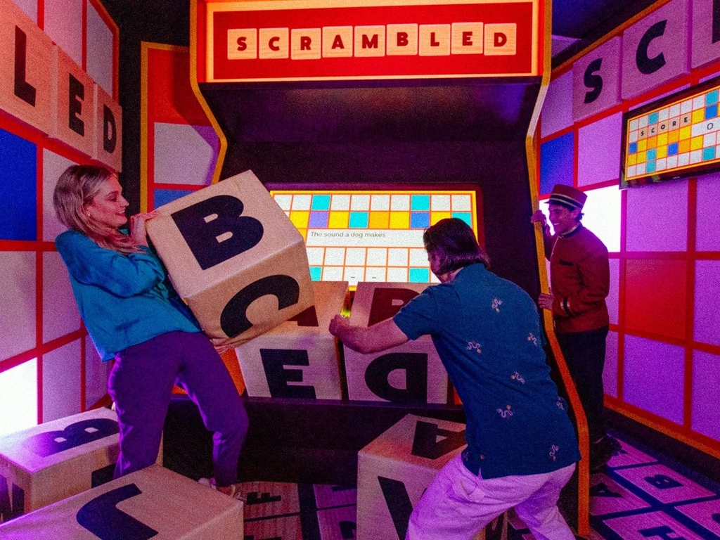 People playing Giant Scrabble