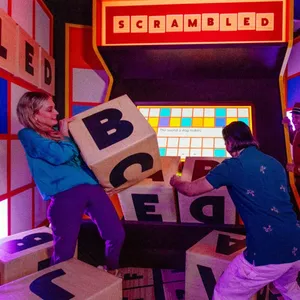 People playing Giant Scrabble